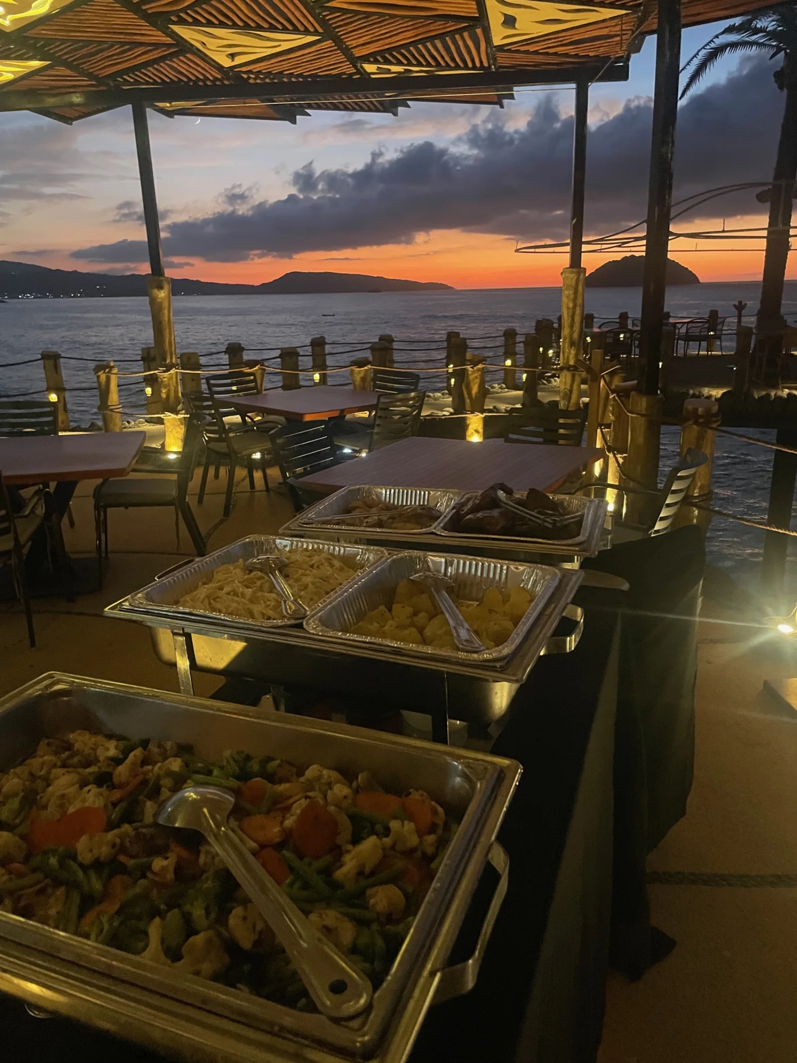 Sunset dining on the oceanfront terrace at La Puesta del Sol